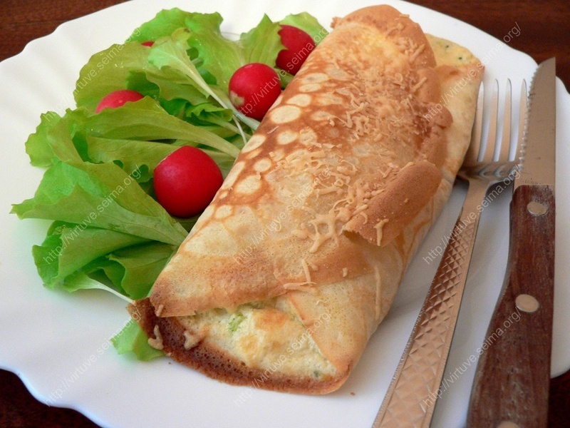 Crepes stuffed with broccoli and cheese