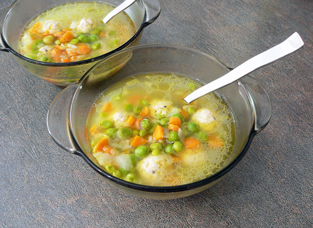 Kids rice soup with green peas