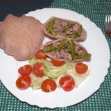 Minced pork and green beans stew in whole grain pita