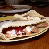 Peppered pork pitas with garlic spread