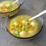 Kids rice soup with green peas