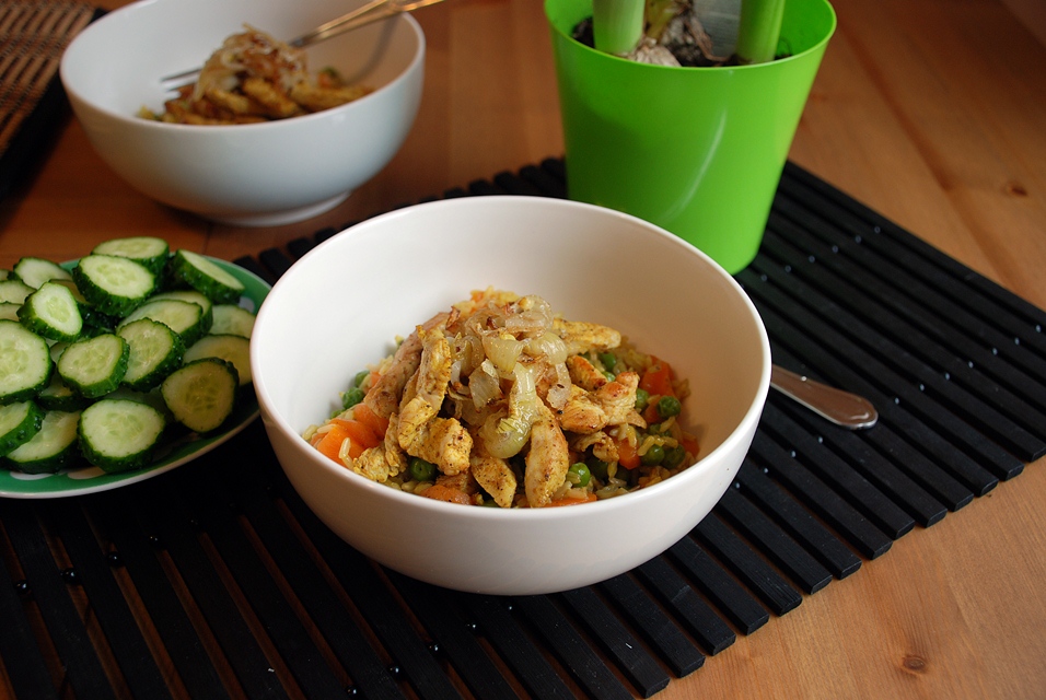 Turkey and rice stew with carrots and green peas